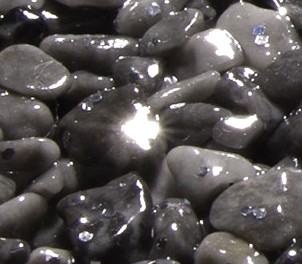 Detailansicht glitzernder Steinteppich