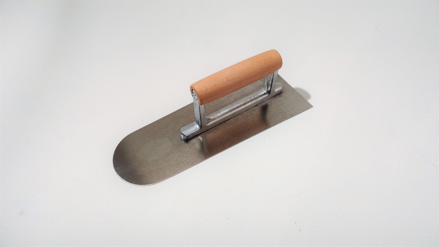 Kurze Glättekelle für Steinteppich